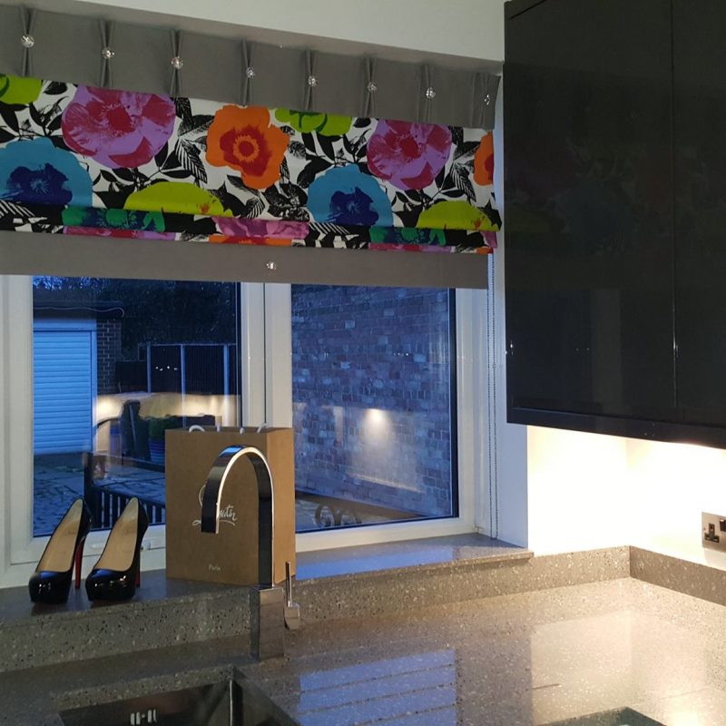 example of work, brightly printed kitchen blinds.
